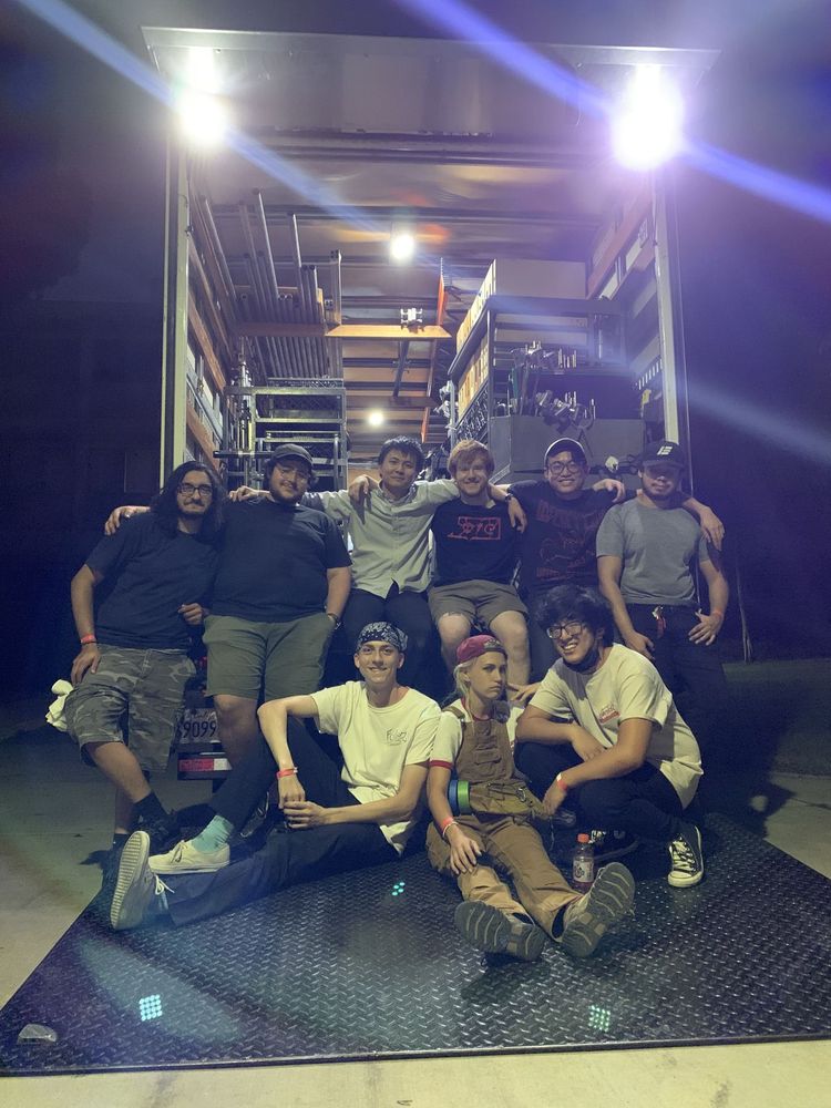 Film crew at the grip truck at night